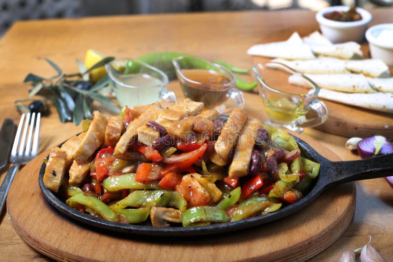 Chicken breast cuts fajitas and vegetables