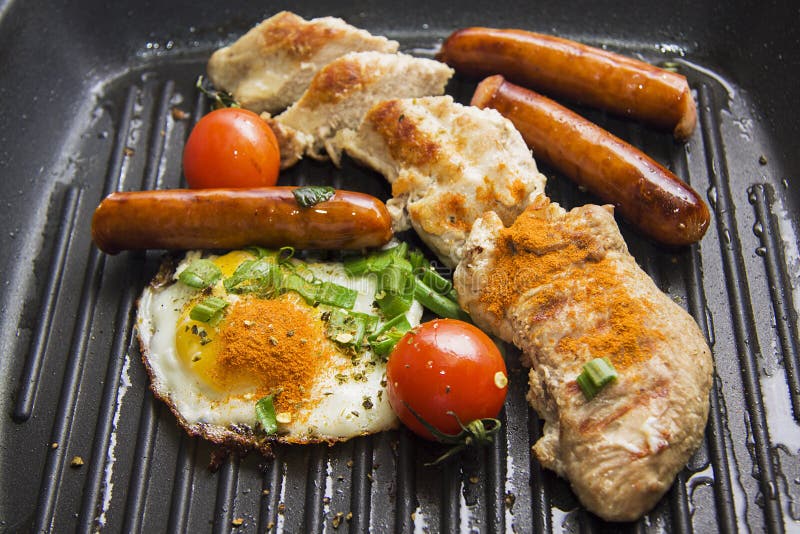 Chicken Breast on Grill with Egg, Sausages Stock Photo Image of meat