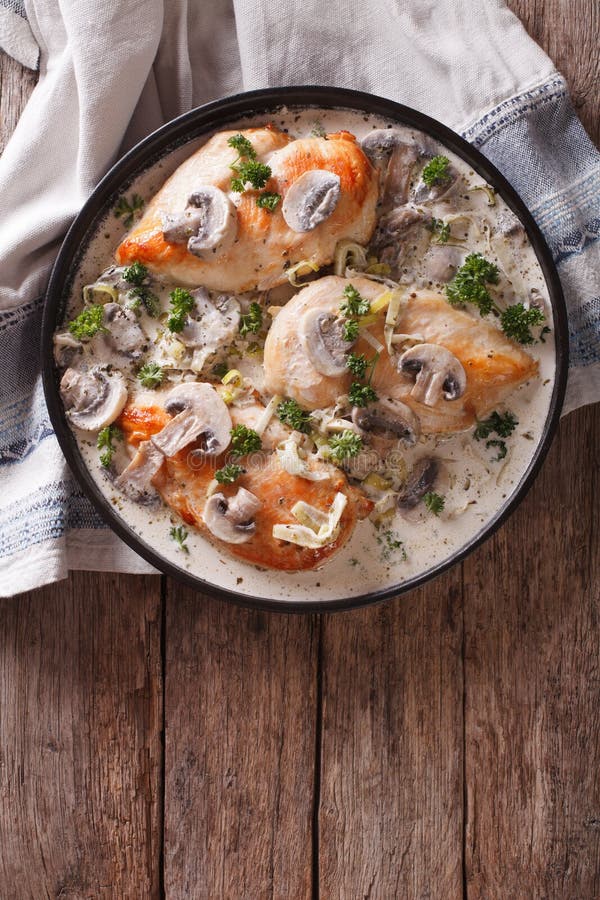 Chicken Breast with Mushrooms in Cream Sauce Vertical Top View Stock