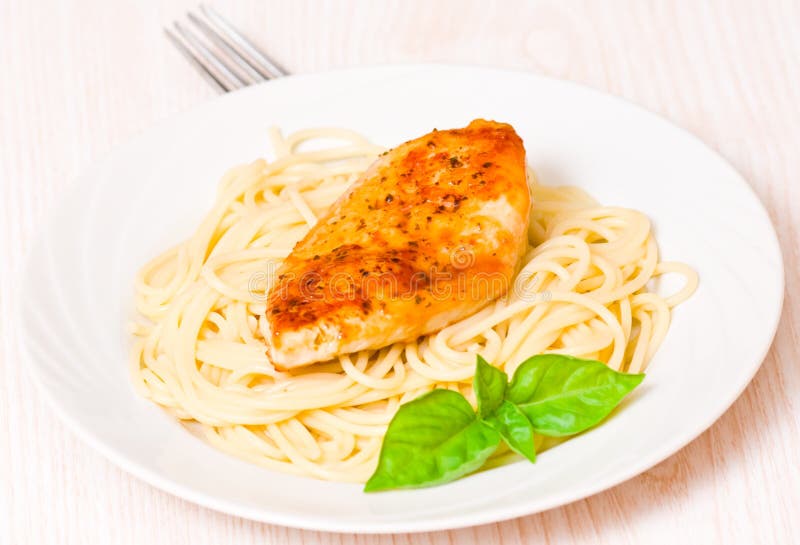 Chicken breast with pasta stock photo. Image of fillet 33029026