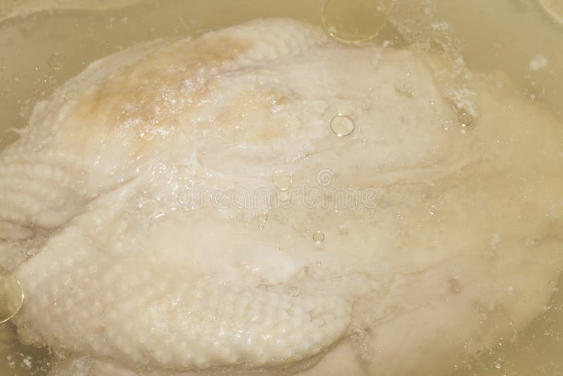 Chicken is Cooked in Chicken Broth.Background of Boiled Chicken Stock