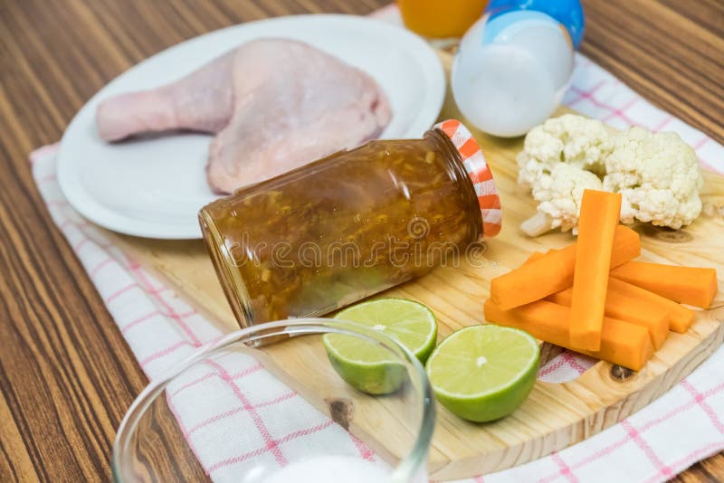 Chicken Cooked with Orange Marmalade, Lemon and Carrots . Stock Photo