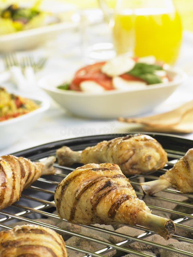 Chicken Cooking on a Grill stock photo. Image of barbeque 8755414