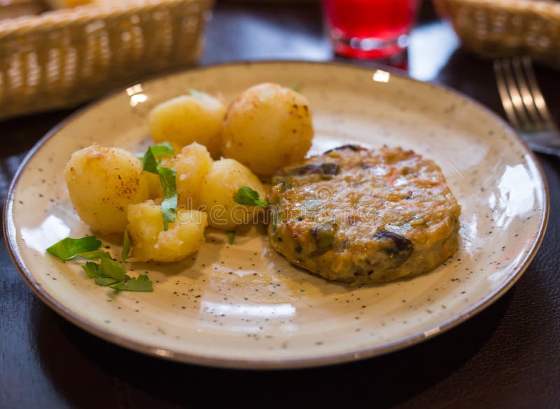 Chicken Cutlet with Vegetables with Boiled Potatoes on a Plate Stock