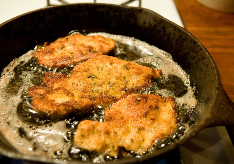 Chicken cutlets frying stock photo. Image of frying, olive - 37260532