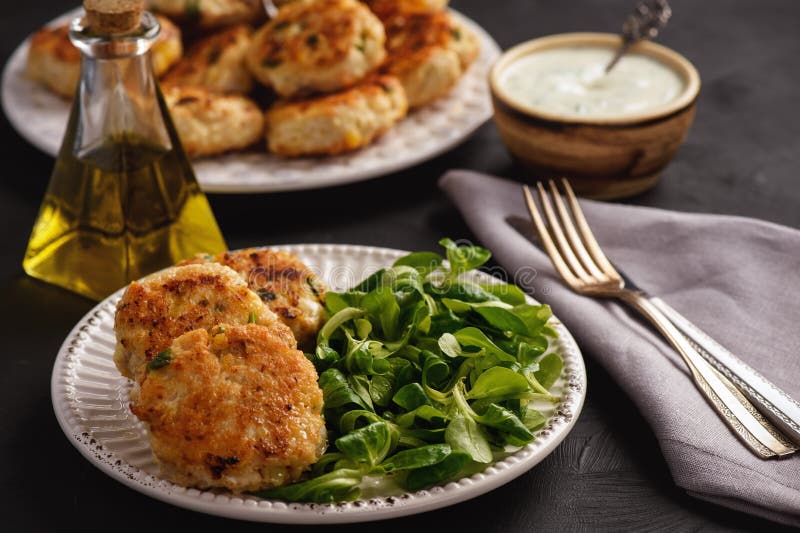 Chicken Cutlets Served with Mashed Potatoes, Salad and Garlic Dip
