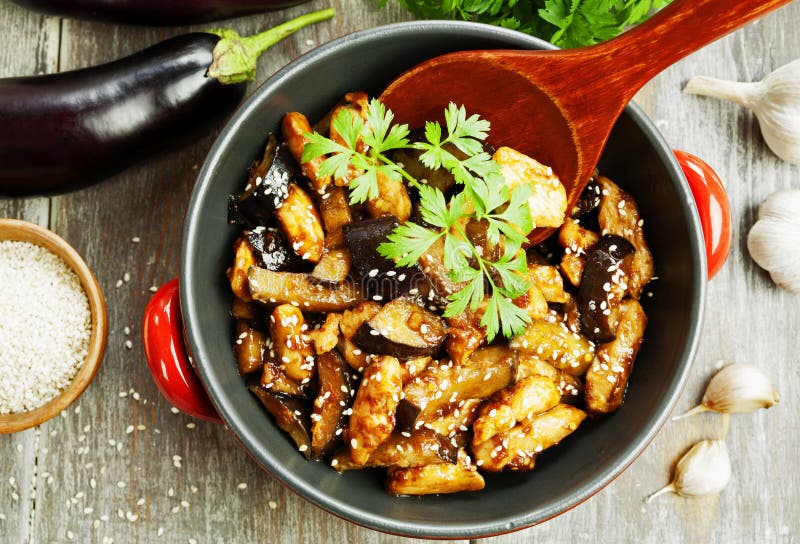 Chicken with eggplants stock photo. Image of fried, meat 129607462