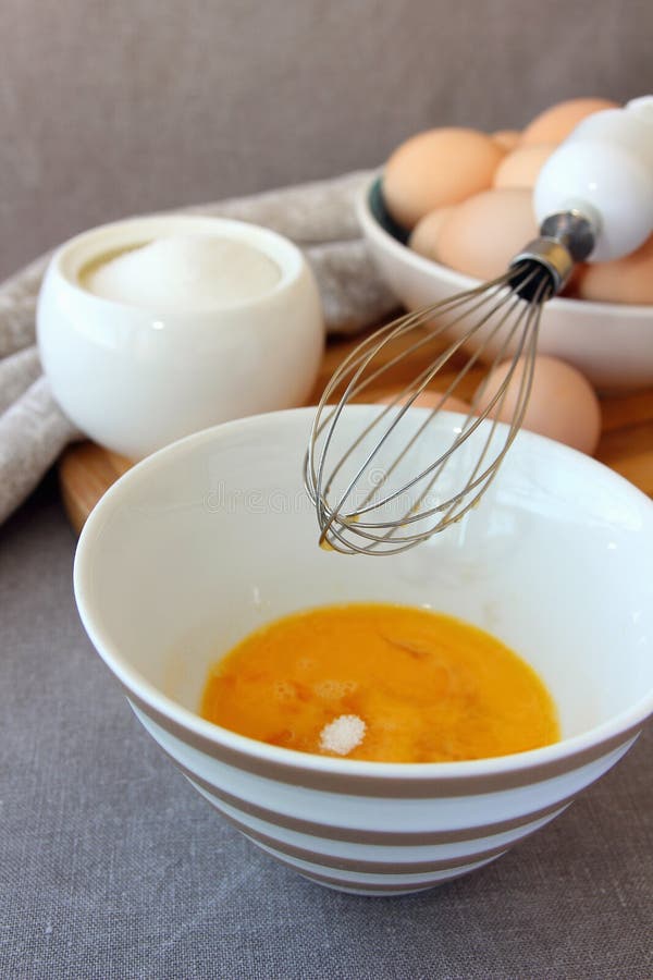Chicken Eggs Beaten in a Bowl. Stock Image Image of baking, wire