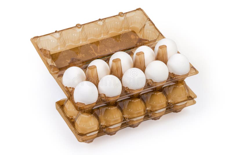Chicken Eggs in Plastic Egg Packaging Trays on White Background Stock