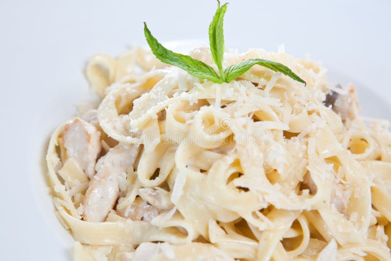 Chicken fettuccine pasta stock image. Image of serve 16246063