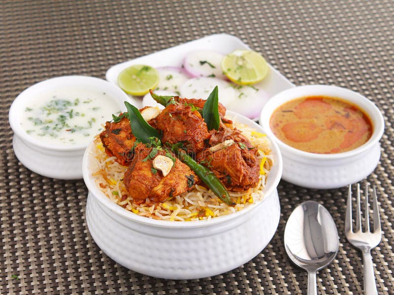 Hyderabad Deccan rice dish made of meat, vegetables with slow cooking process dum availble in lot of varieties like chicken, mutton, vegetarian, prawn, mushroom, paneer. Chicken dum biryani stock images, royalty-free photos and pictures