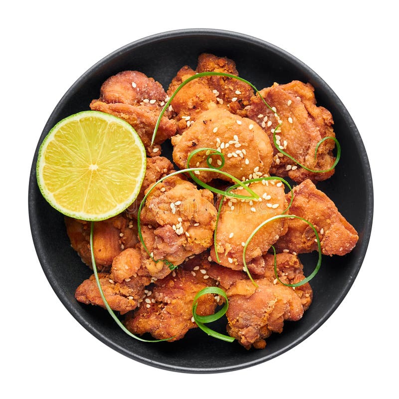Chicken Karaage in black bowl isolated on white background. Karaage is traditional japanese cuisine dish stock image Chicken Karaage in black bowl isolated on white background. Karaage is traditional japanese cuisine dish stock image