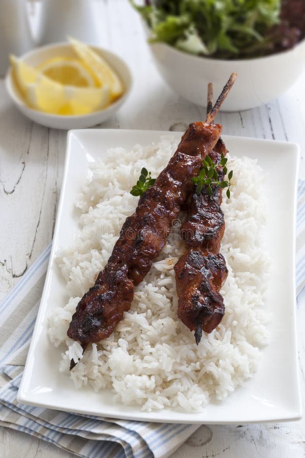 Chicken Kebabs Over Rice with Salad Stock Image - Image of kebab, asian ...