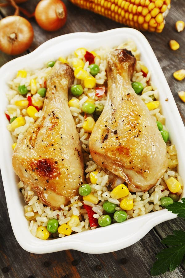 Chicken Legs Baked with Rice and Vegetables Stock Photo - Image of legs