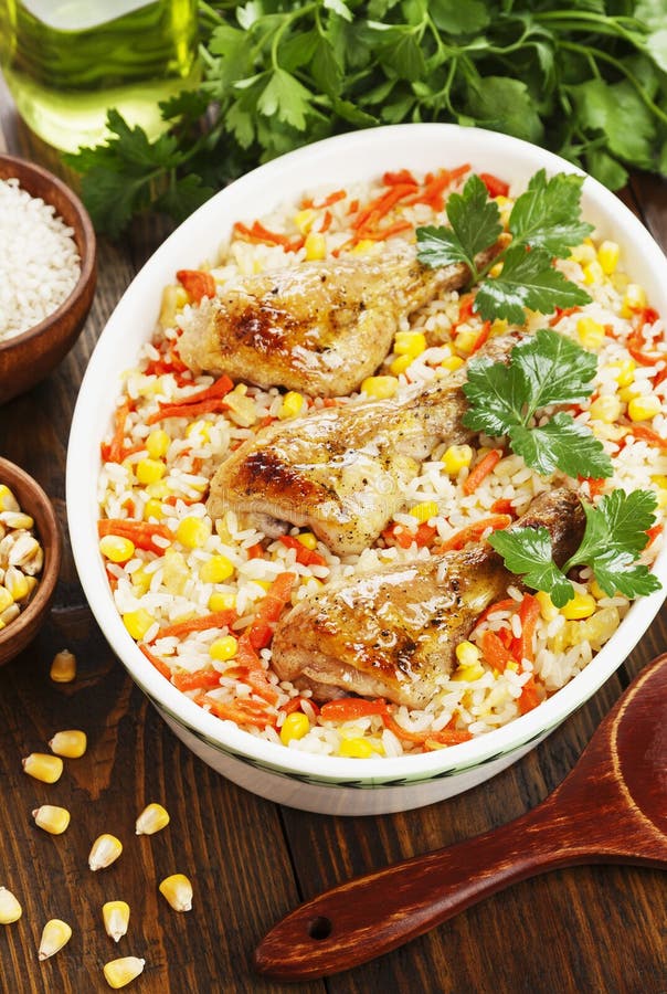 Chicken Legs Baked with Rice and Vegetables Stock Photo - Image of rice