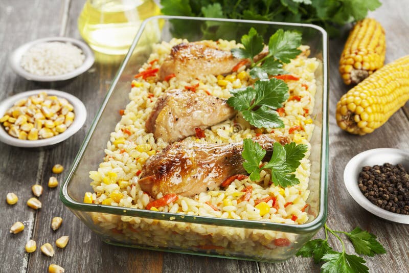 Chicken Legs Baked with Rice and Vegetables Stock Photo - Image of corn