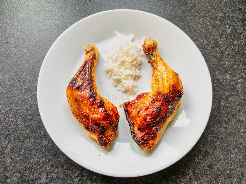 Chicken Legs with BBQ Glaze and Some Boiled Rice Stock Image Image of