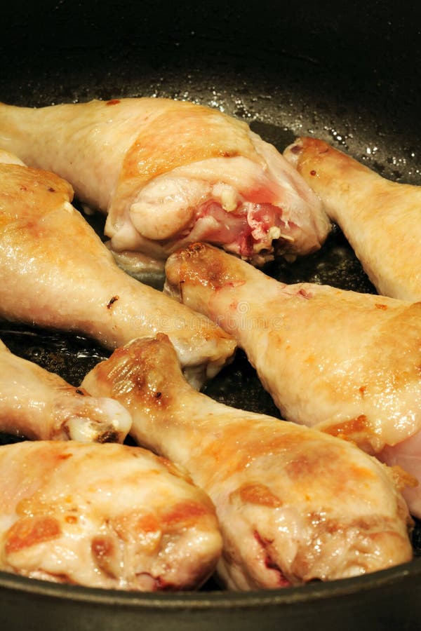 Chicken Legs Cooking stock image. Image of stove, nutrition 12916647