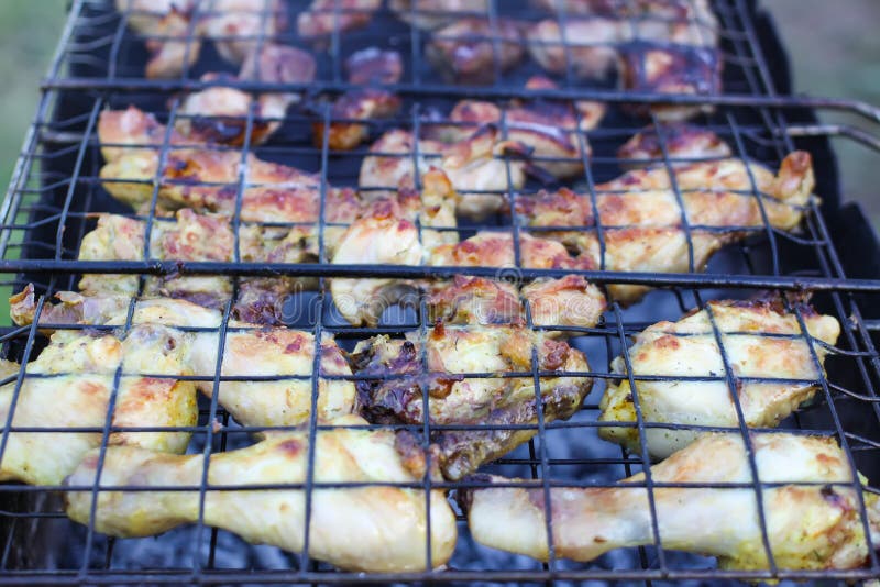 Chicken legs on grill. stock photo. Image of fire, cooking 105100286