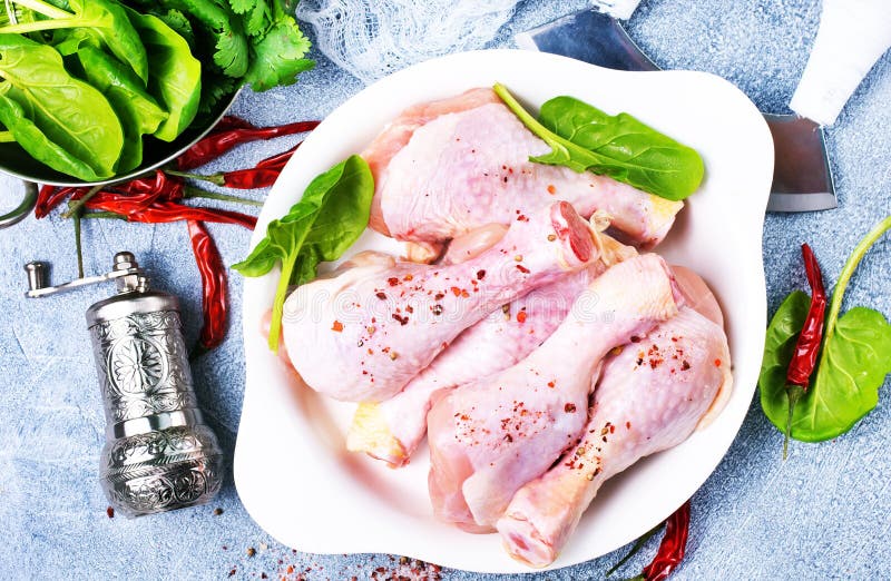 Chicken legs with spinach stock photo. Image of lettuce 125244732
