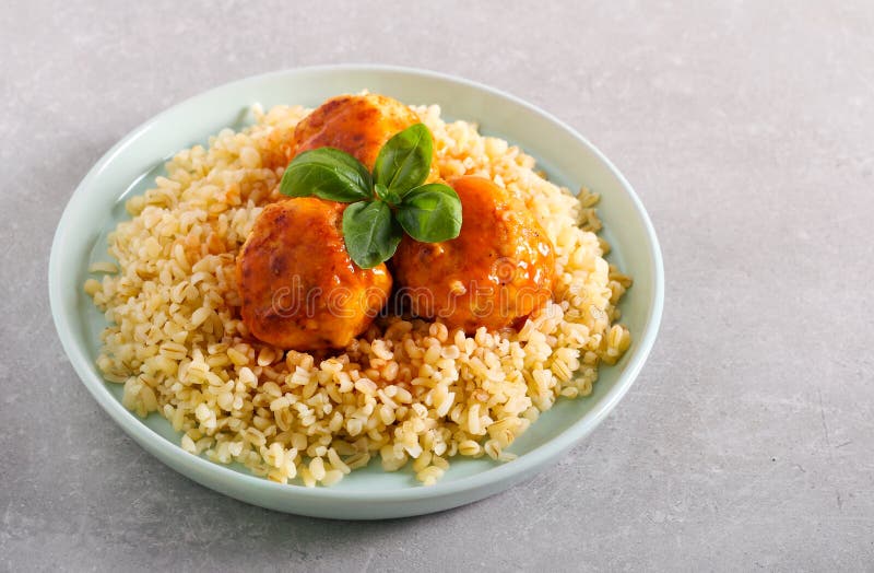 Chicken Meatballs Over Bulgur Wheat Stock Photo Image of background