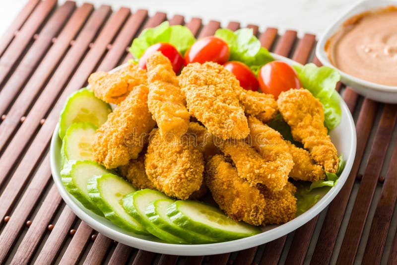 Chicken nuggets with fries stock image. Image of cucumber 85212411
