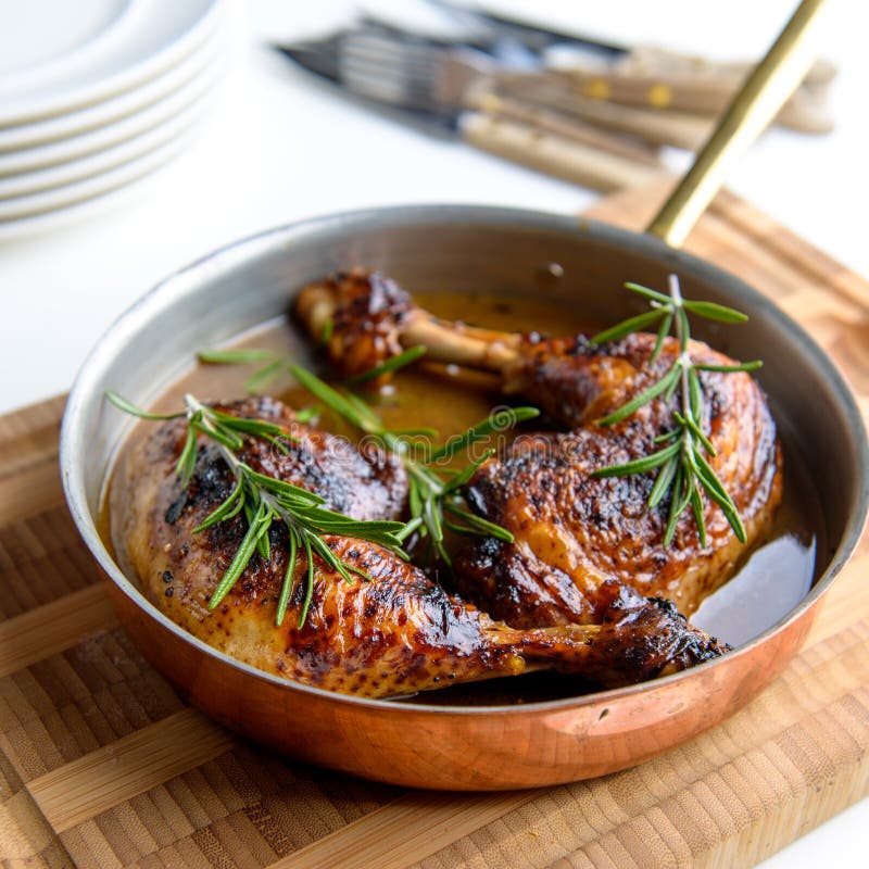 Chicken in pan on white background