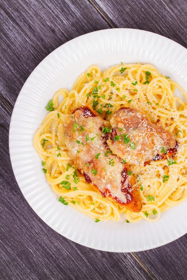 Chicken Parmesan and Pasta. Chicken Breasts and Spaghetti Stock Photo