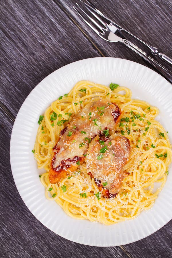 Chicken Parmesan and Pasta. Chicken Breasts and Spaghetti Stock Image