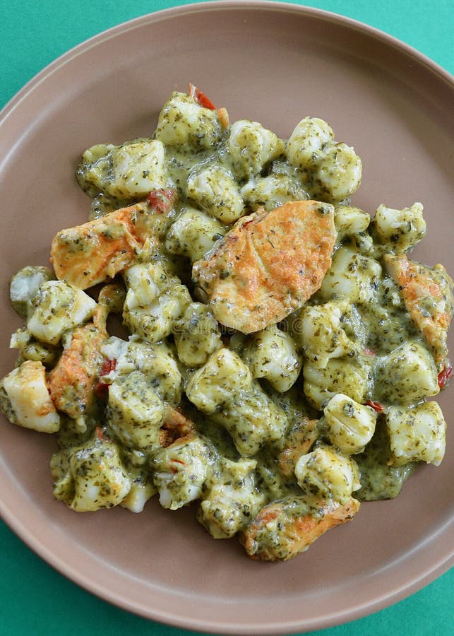 Chicken pesto gnocchi stock image. Image of pesto, meat - 258670237