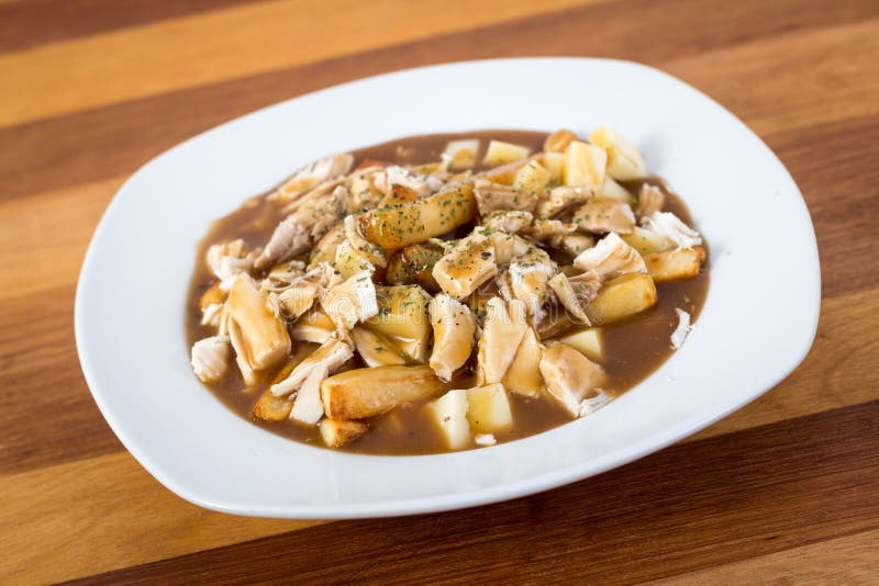 Chicken poutine quebec cuisine royalty free stock images