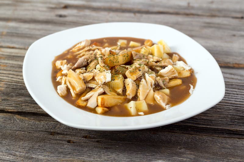 Chicken poutine quebec cuisine royalty free stock image