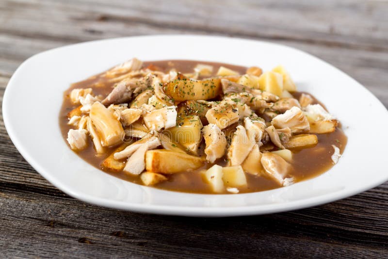 Chicken poutine quebec cuisine royalty free stock photo