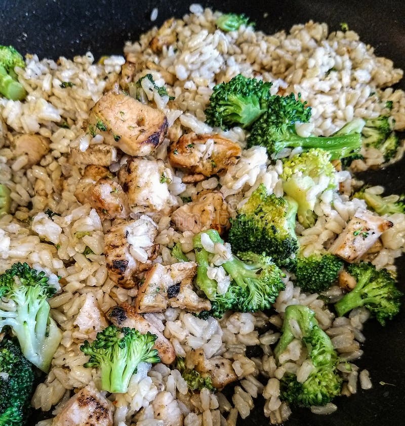 Chicken Rice and Broccoli stock image. Image of brown 144233281