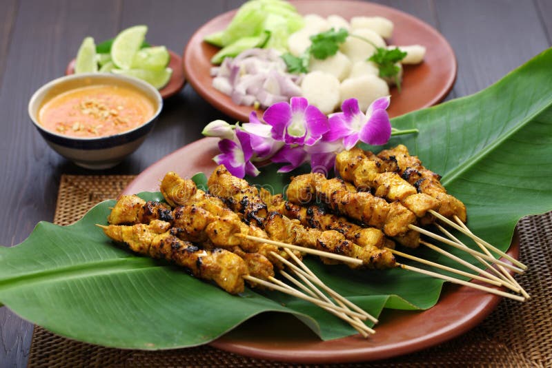 Chicken satay with peanut sauce, indonesian skewer cuisine royalty free stock photo Chicken satay with peanut sauce, indonesian skewer cuisine royalty free stock photo