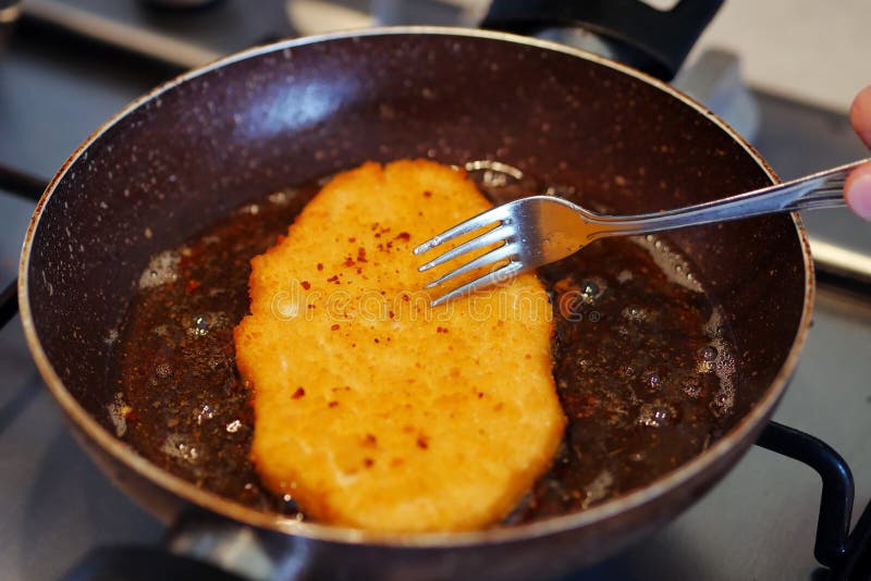 Chicken Schnitzel Cooked in Oil on the Stove, Large Chicken Schnitzel