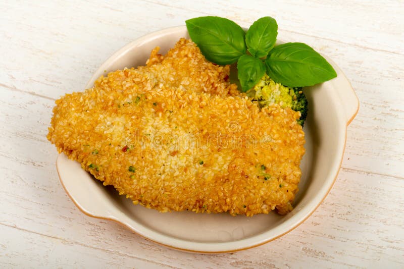 Chicken with sesame seeds stock image. Image of seed 136577405