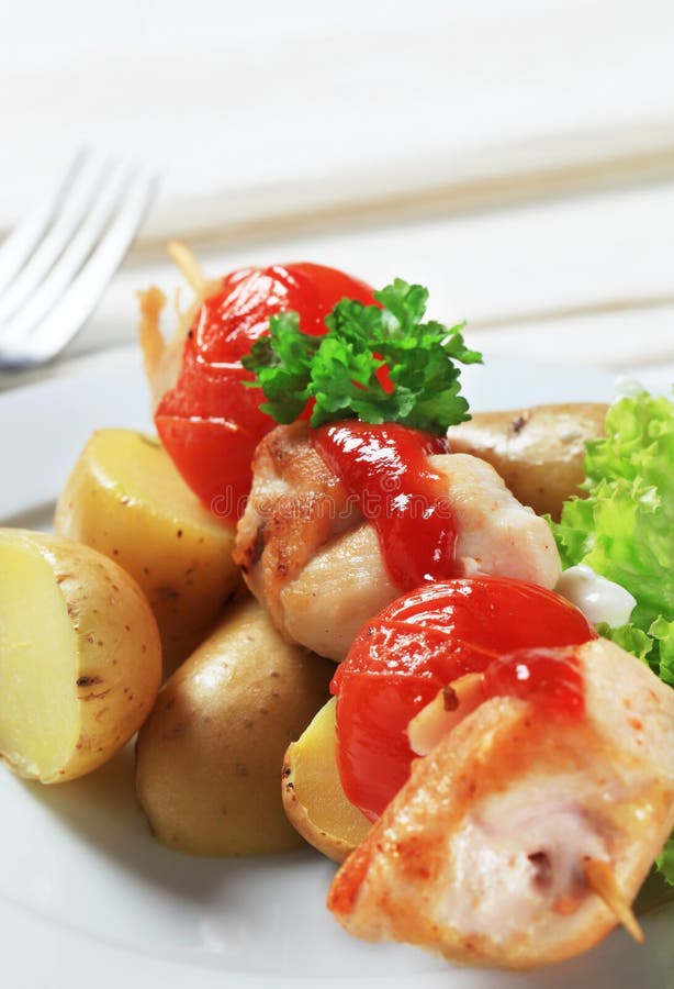 Chicken skewer with potatoes