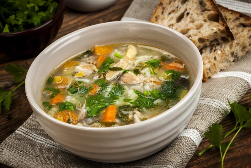 Chicken soup with rice and vegetables stock images Chicken soup with rice and vegetables stock images