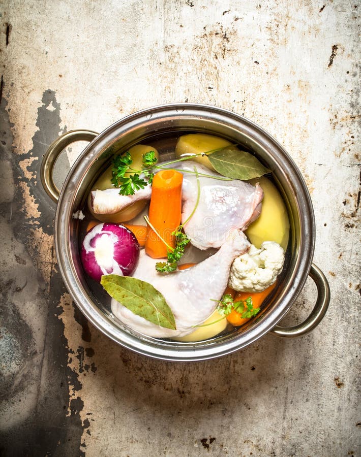 Chicken soup with vegetables. On rustic background. Chicken fillet vegetable soup stock images, royalty-free photos and pictures