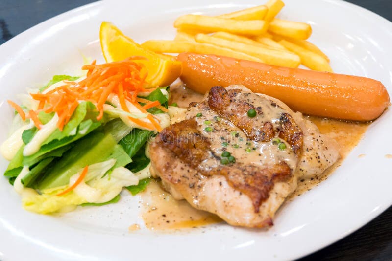 Chicken Steak With Sausage And Salade On White Dish Stock Image Image: 37387191 Chicken Steak With Sausage And Salade On White Dish Stock Image Image: 37387191