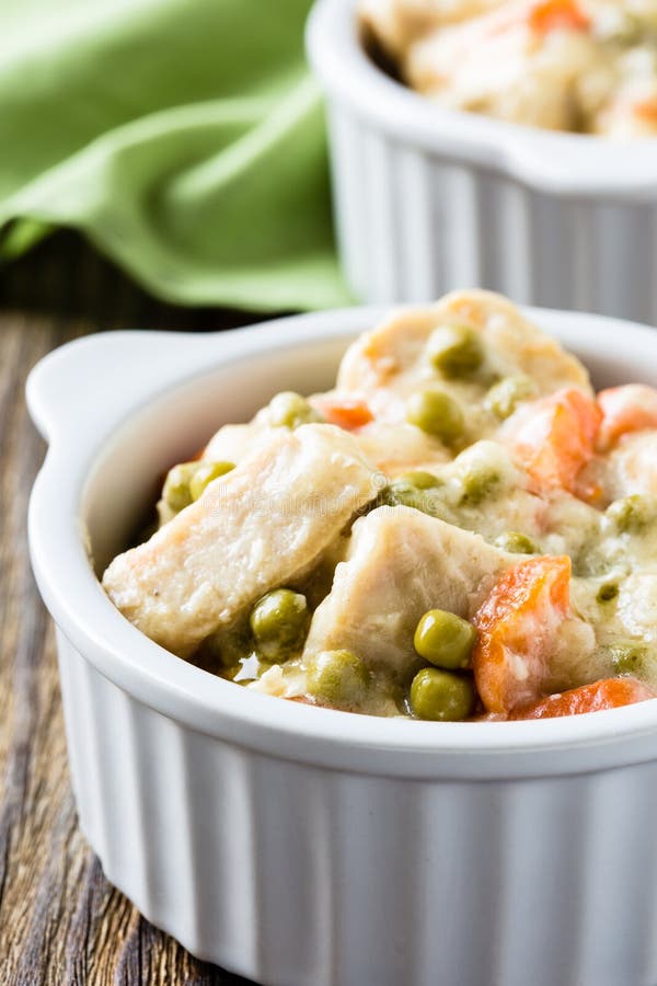 Chicken Stew with Carrot and Green Peas in a Sauce Stock Photo - Image ...