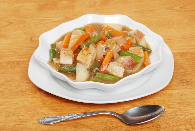 Chicken stew with a spoon stock photo. Image of meal 12078332