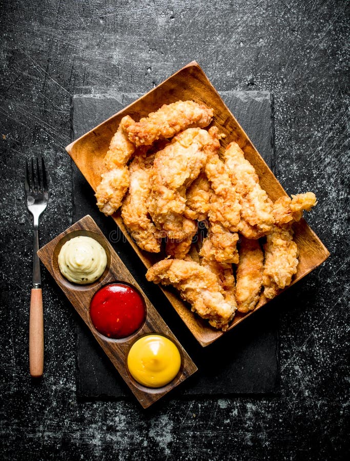 Chicken Strips With Different Sauces And Fork Stock Image Image of