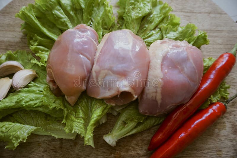 Chicken thigh fillet stock photo. Image of protein, background 267407222