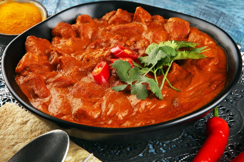 Chicken Tikka Masala Spicy Curry Meat Food in Pot with Rice and Naan ...