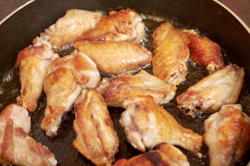 Chicken Wings Fried in Pan with Hot Oil, Homemade Food Stock Image ...