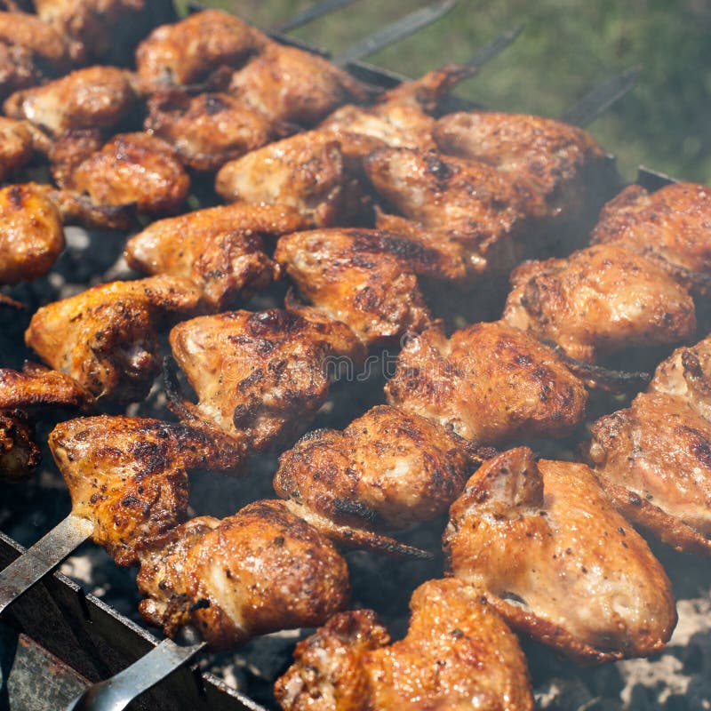 Chicken wings at outdoors grill