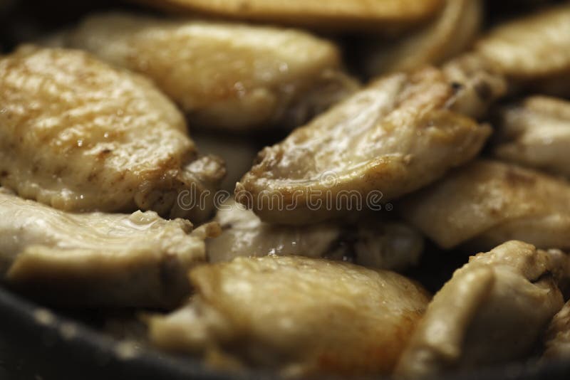 Chicken wings in pan stock photo. Image of grilled, poultry 92853792