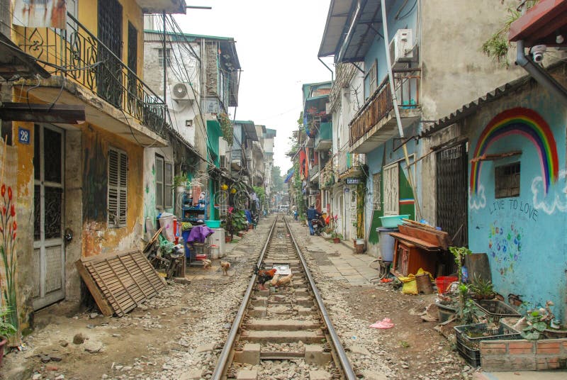 chickens-eating-track-train-street-hanoi-vietnam-train-street-hanoi-vietnam-165923582.jpg